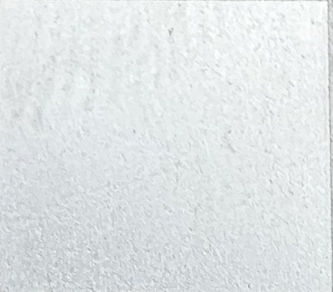 Example image · Weiß on Stainless 304 · Laser: ComMarker B6 60W Mopa · Lens: 150mm · Entry #11 · Image 1 of 2